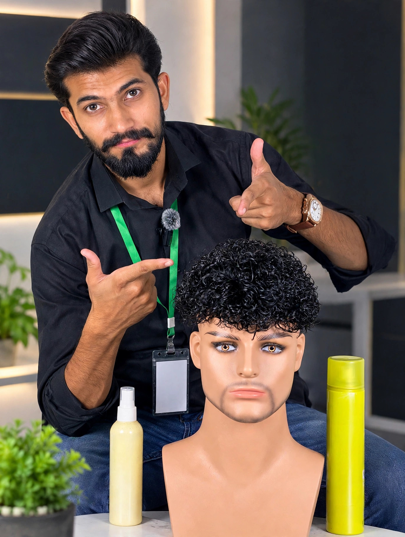 Numan Ashfaq, Chief Executive of Apex Hair Solution, with a curly hair patch on display